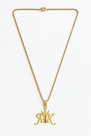 Rajkumarr signature RK pendant necklace with red vermillion detailing displayed against a clean product background, showing the full chain and pendant in high clarity.